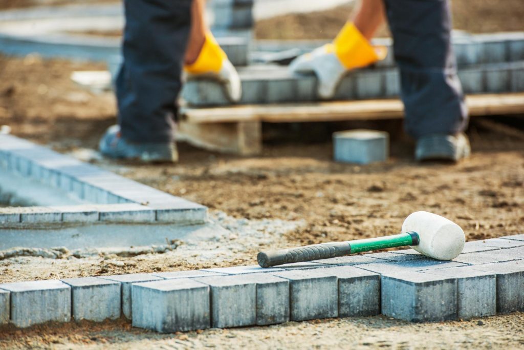 construction man working on putting bricks