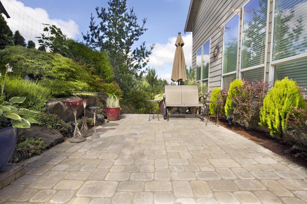 concrete bricked floor of the house's patio